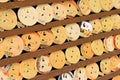 Mrror-shaped wooden preyer tablets (Kagami ema) in Kyoto, Japan. Royalty Free Stock Photo